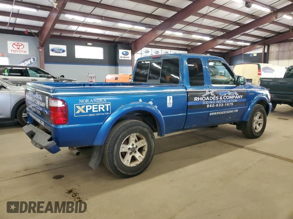 2002 Ford Ranger XL Fleet with VIN 1FTZR45E22TA06974, listed as a Copart auction lot 58312585 with 156,828 mi miles and Salvage title. Bid and sale history available at DreamBid. Image 3.