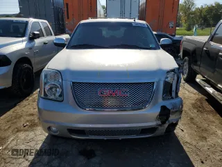 2013 GMC Yukon Denali with VIN 1GKS2EEF0DR311141, listed as a Copart auction lot 74823594 with 125,580 mi miles and Salvage Title. Bid and sale history available at carsss.com. Image 5.