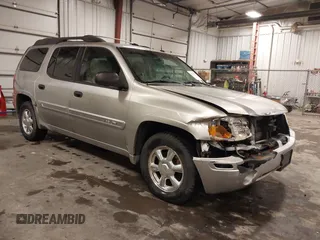 2005 GMC Envoy SLE with VIN 1GKET16S656102522, listed as a IAAI auction lot 41729310 with 233,049 mi miles. Bid and sale history available at carsss.com. Image 1.