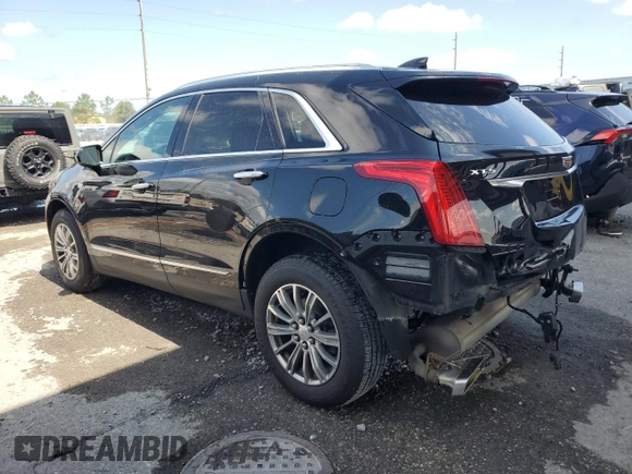 2017 Cadillac XT5 Luxury AWD with VIN 1GYKNDRS6HZ243674, listed as a Copart auction lot 59569145 with 74,550 mi miles and Salvage title. Bid and sale history available at DreamBid. Image 2.