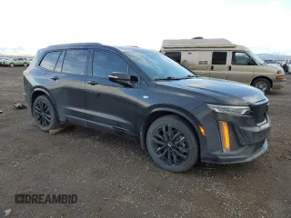 2021 Cadillac XT6 AWD Sport z VIN 1GYKPHRSXMZ164181, wystawiony jako Copart lot #84267124 z przebiegiem 70 658 mil mil oraz Szkody całkowita. Historia ofert i sprzedaży dostępna na DreamBid. Obrazek 4.