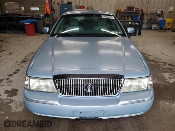 2003 Mercury Grand Marquis LS Premium z VIN 2MEHM75W33X645484, wystawiony jako Copart lot #58664585 z przebiegiem 145 064 mil mil oraz Czysty tytuł • Clean title. Historia ofert i sprzedaży dostępna na DreamBid. Obrazek 5.