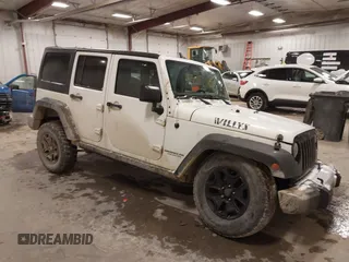 2016 Jeep Wrangler Unlimited Sport with VIN 1C4BJWDGXGL343410, listed as a IAAI auction lot 41097189 with 146,584 mi miles and . Bid and sale history available at DreamBid. Image 1.
