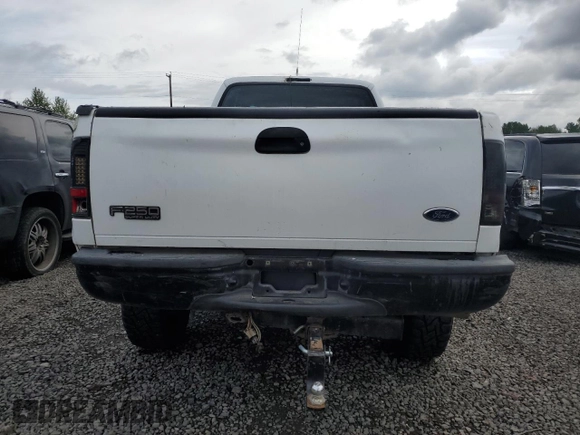 2004 Ford F-250 XL with VIN 1FTNX21P34ED08796, listed as a Copart auction lot 54789995 with 141,634 mi miles and Salvage title. Bid and sale history available at DreamBid. Image 6.