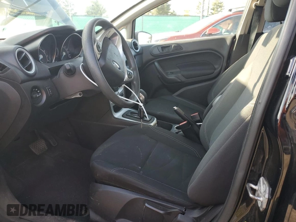 2019 Ford Fiesta SE z VIN 3FADP4BJXKM109534, wystawiony jako Copart lot #54074555 z przebiegiem 84 360 mil mil oraz Szkoda całkowita • Salvage title. Historia ofert i sprzedaży dostępna na DreamBid. Obrazek 7.