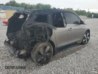 2015 BMW i3 with VIN WBY1Z4C59FV504906, listed as a Copart auction lot 63290095 with Not provided miles and Salvage title. Bid and sale history available at DreamBid. Image 3.