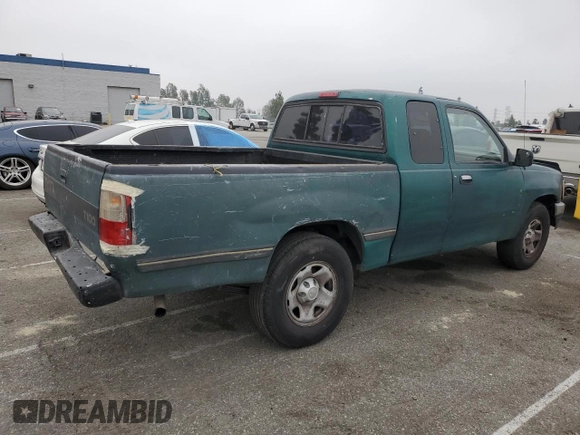 1996 Toyota T100 DX z VIN JT4TN12D2T0026690, wystawiony jako Copart lot #52937955 z przebiegiem 287 729 mil mil oraz Tytuł czysty. Historia ofert i sprzedaży dostępna na DreamBid. Obrazek 3.