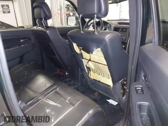 2012 Jeep Liberty Sport with VIN 1C4PJMAKXCW169544, listed as a IAAI auction lot 42045754 with 77,829 mi miles. Bid and sale history available at carsss.com. Image 8.