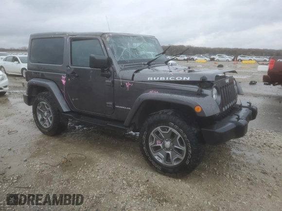 2014 Jeep Wrangler Rubicon with VIN 1C4BJWCG9EL189819, listed as a Copart auction lot 80522204 with 82,083 mi miles and Salvage title. Bid and sale history available at DreamBid. Image 4.