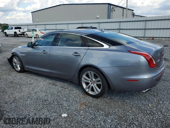 2015 Jaguar XJ Portfolio with VIN SAJWJ2GD2F8V75238, listed as a Copart auction lot 73633984 with 102,545 mi miles and Salvage title. Bid and sale history available at DreamBid. Image 2.
