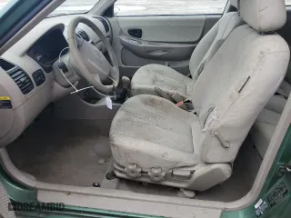 2005 Hyundai Accent GLS with VIN KMHCG35C05U356585, listed as a Copart auction lot 40091384 with 60,289 mi miles and Salvage Title. Bid and sale history available at carsss.com. Image 7.