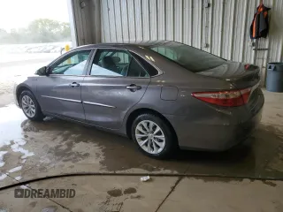 2015 Toyota Camry LE z VIN 4T1BD1FK1FU172465, wystawiony jako Copart lot #60708715 z przebiegiem 217 544 mil mil oraz Czysty tytuł • Clean title. Historia ofert i sprzedaży dostępna na DreamBid. Obrazek 2.