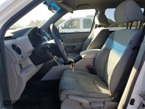 2011 Honda Pilot LX with VIN 5FNYF4H21BB094179, listed as a Copart auction lot 80498764 with 183,544 mi miles and Salvage Title. Bid and sale history available at DreamBid. Image 7.