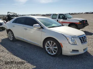 2014 Cadillac XTS Premium z VIN 2G61P5S35E9313677, wystawiony jako Copart lot #50205465 z przebiegiem 71 264 mil mil oraz Szkoda całkowita • Salvage title. Historia ofert i sprzedaży dostępna na DreamBid. Obrazek 4.