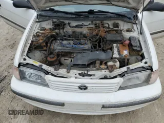 1998 Toyota Tercel DX z VIN JT2AC52L2W0307400, wystawiony jako Copart lot #80497644 z przebiegiem 72 167 mil mil oraz Czysty tytuł • Clean title. Historia ofert i sprzedaży dostępna na DreamBid. Obrazek 11.