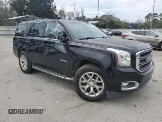 2015 GMC Yukon SLT with VIN 1GKS1BKC1FR615562, listed as a Copart auction lot 46374135 with 141,207 mi miles and Salvage Title. Bid and sale history available at carsss.com. Image 4.