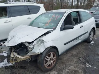 2000 Ford Focus ZX3 with VIN 3FAFP3130YR210633, listed as a IAAI auction lot 41376240 with Not Provided miles and . Bid and sale history available at carsss.com. Image 2.
