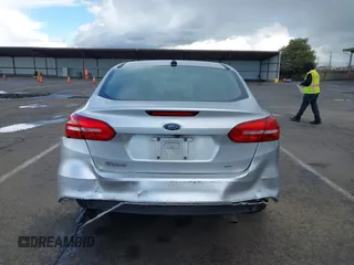 2016 Ford Focus SE with VIN 1FADP3F25GL384296, listed as a IAAI auction lot 41765750 with 158,695 mi miles. Bid and sale history available at carsss.com. Image 16.
