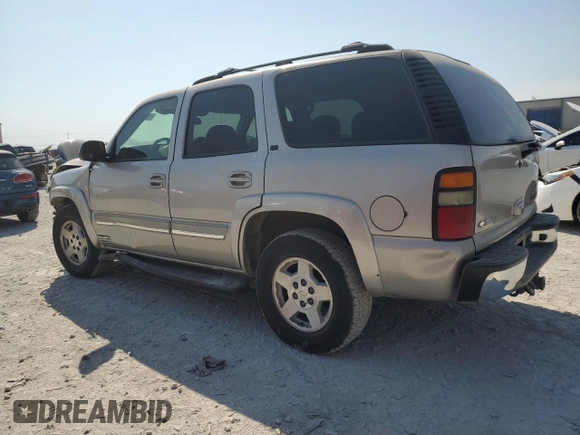 2004 Chevrolet Tahoe LT with VIN 1GNEC13ZX4R306385, listed as a Copart auction lot 75694864 with 168,142 mi miles and Salvage Title. Bid and sale history available at carsss.com. Image 2.