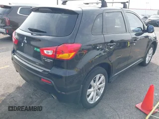 2012 Mitsubishi Outlander Sport SE with VIN JA4AP4AU6CZ000667, listed as a IAAI auction lot 41473935 with 195,414 mi miles. Bid and sale history available at carsss.com. Image 4.