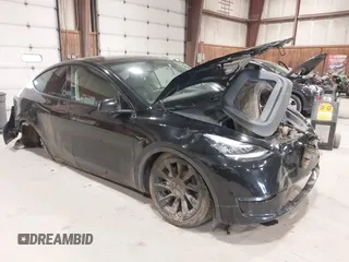 2022 Tesla Model Y Long Range z VIN 7SAYGDEE0NF342215, wystawiony jako IAAI lot #42136858 z przebiegiem 53 037 mil mil oraz . Historia ofert i sprzedaży dostępna na DreamBid. Obrazek 1.