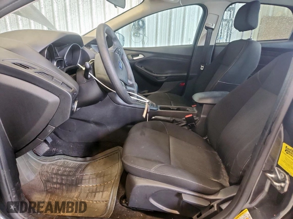 2018 Ford Focus SE with VIN 1FADP3FE0JL311760, listed as a Copart auction lot 63621755 with 81,000 mi miles and Salvage title. Bid and sale history available at DreamBid. Image 7.