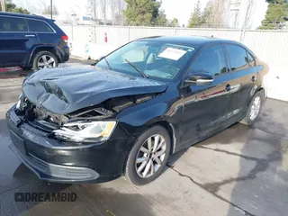 2012 Volkswagen Jetta Sedan SE w/Convenience PZEV with VIN 3VWDP7AJ3CM322336, listed as a IAAI auction lot 41572929 with 176,086 mi miles. Bid and sale history available at carsss.com. Image 2.