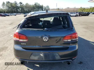 2012 Volkswagen GTI w/Conv & Sunroof with VIN WVWEV7AJ4CW125785, listed as a Copart auction lot 49780335 with 125,837 mi miles and Salvage title. Bid and sale history available at DreamBid. Image 6.