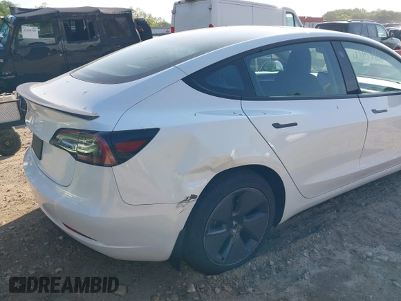2023 Tesla Model 3 with VIN 5YJ3E1EA3PF617460, listed as a IAAI auction lot 42154401 with 9,578 mi miles and . Bid and sale history available at DreamBid. Image 18.