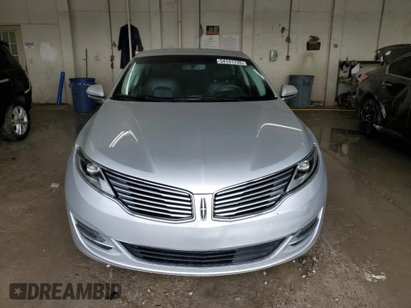 2015 Lincoln MKZ z VIN 3LN6L2GK4FR613117, wystawiony jako Copart lot #54141735 z przebiegiem 129 072 mil mil oraz Szkoda całkowita • Salvage title. Historia ofert i sprzedaży dostępna na DreamBid. Obrazek 5.