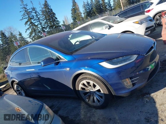 2017 Tesla Model X 90D z VIN 5YJXCBE21HF076514, wystawiony jako IAAI lot #41559020 z przebiegiem 108 573 mil mil oraz . Historia ofert i sprzedaży dostępna na DreamBid. Obrazek 13.