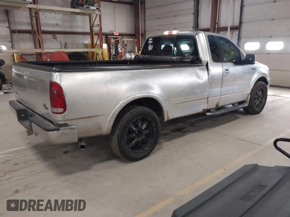 2005 Ford F-150 XL with VIN 1FTRF12W15NA18935, listed as a IAAI auction lot 41942570 with 152,708 mi miles and . Bid and sale history available at DreamBid. Image 4.