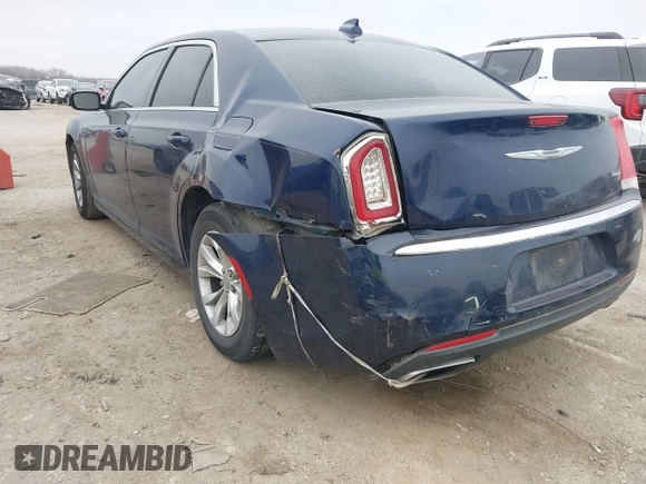 2015 Chrysler 300 Limited with VIN 2C3CCAAG5FH796498, listed as a IAAI auction lot 41520694 with 165,433 mi miles. Bid and sale history available at carsss.com. Image 6.