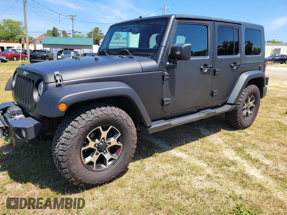 2014 Jeep Wrangler Unlimited Sport with VIN 1C4HJWDG4EL159619, listed as a IAAI auction lot 42176313 with 79,715 mi miles and . Bid and sale history available at DreamBid. Image 2.
