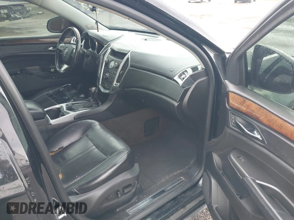 2012 Cadillac SRX Luxury Collection z VIN 3GYFNAE39CS505319, wystawiony jako IAAI lot #42240143 z przebiegiem 215 376 mil mil oraz . Historia ofert i sprzedaży dostępna na DreamBid. Obrazek 5.