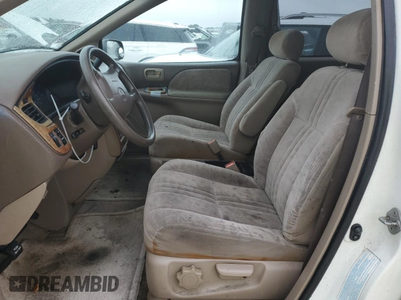 2001 Toyota Sienna LE with VIN 4T3ZF13C21U369506, listed as a Copart auction lot 74561634 with 0 mi miles and Salvage Title. Bid and sale history available at carsss.com. Image 7.