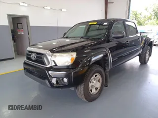 2014 Toyota Tacoma with VIN 3TMMU4FN8EM068633, listed as a IAAI auction lot 42727713 with 185,402 mi miles and . Bid and sale history available at DreamBid. Image 14.