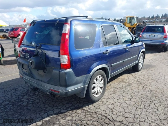 2005 Honda CR-V EX with VIN JHLRD78865C044883, listed as a IAAI auction lot 41703072 with 180,242 mi miles. Bid and sale history available at carsss.com. Image 4.