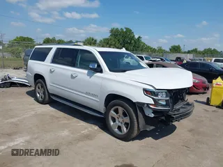 2020 Chevrolet Suburban Premier z VIN 1GNSCJKC9LR125292, wystawiony jako IAAI lot #42073858 z przebiegiem 92 363 mil mil oraz . Historia ofert i sprzedaży dostępna na DreamBid. Obrazek 1.