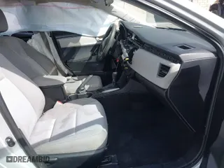 2016 Toyota Corolla L with VIN 5YFBURHE8GP543419, listed as a IAAI auction lot 41602003 with 121,048 mi miles. Bid and sale history available at carsss.com. Image 5.