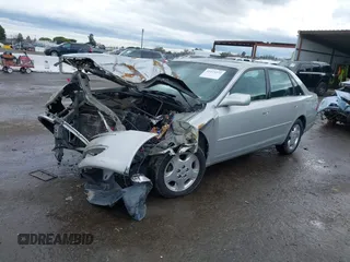 2004 Toyota Avalon XL with VIN 4T1BF28B44U364702, listed as a IAAI auction lot 41473272 with 226,845 mi miles. Bid and sale history available at carsss.com. Image 2.