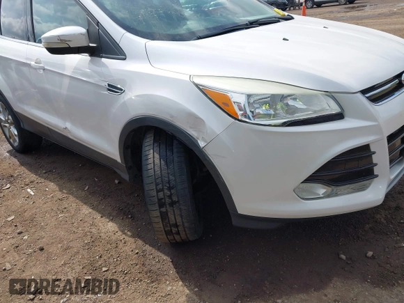 2013 Ford Escape SEL with VIN 1FMCU9HX6DUB14053, listed as a IAAI auction lot 42361297 with 144,861 mi miles and . Bid and sale history available at DreamBid. Image 6.