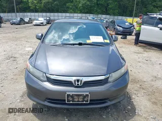 2012 Honda Civic LX z VIN 19XFB2F54CE038958, wystawiony jako IAAI lot #42136832 z przebiegiem 154 822 mil mil oraz . Historia ofert i sprzedaży dostępna na DreamBid. Obrazek 12.