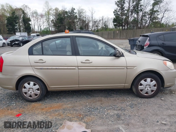 2006 Hyundai Accent GLS z VIN KMHCN46C66U058232, wystawiony jako IAAI lot #41899629 z przebiegiem 182 669 mil mil oraz . Historia ofert i sprzedaży dostępna na DreamBid. Obrazek 13.