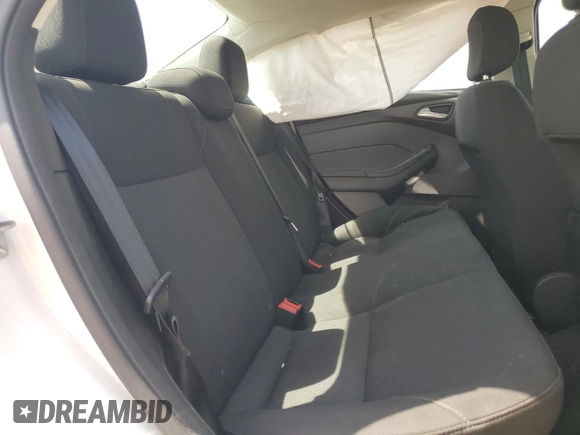 2018 Ford Focus SE z VIN 1FADP3F25JL272797, wystawiony jako Copart lot #54626215 z przebiegiem 116 679 mil mil oraz Szkoda całkowita • Salvage title. Historia ofert i sprzedaży dostępna na DreamBid. Obrazek 10.