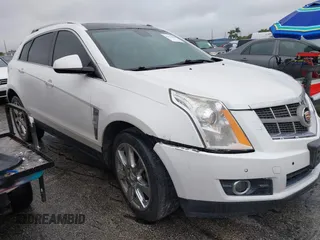 2012 Cadillac SRX Performance Collection with VIN 3GYFNEE33CS528697, listed as a IAAI auction lot 41374060 with 157,319 mi miles and . Bid and sale history available at DreamBid. Image 12.