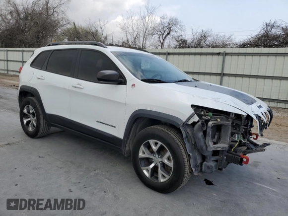 2014 Jeep Cherokee Trailhawk with VIN 1C4PJMBS3EW294676, listed as a Copart auction lot 47652335 with 161,663 mi miles and Salvage Title. Bid and sale history available at carsss.com. Image 4.