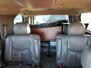 2003 Cadillac Escalade z VIN 1GYEC63TX3R135227, wystawiony jako Copart lot #88373245 z przebiegiem 258 595 mil mil oraz Czysty tytuł • Clean title. Historia ofert i sprzedaży dostępna na DreamBid. Obrazek 10.