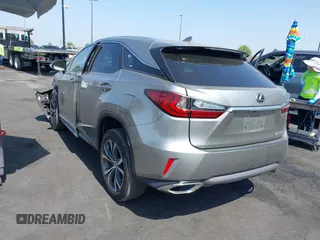 2017 Lexus RX 350 z VIN 2T2ZZMCA3HC041664, wystawiony jako IAAI lot #42379331 z przebiegiem 153 887 mil mil oraz . Historia ofert i sprzedaży dostępna na DreamBid. Obrazek 3.