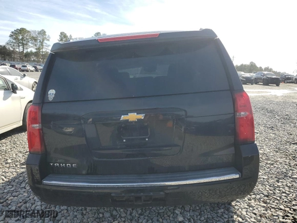 2015 Chevrolet Tahoe LTZ with VIN 1GNSKCKC9FR191554, listed as a Copart auction lot 42816695 with 98,394 mi miles and Salvage Title. Bid and sale history available at carsss.com. Image 6.